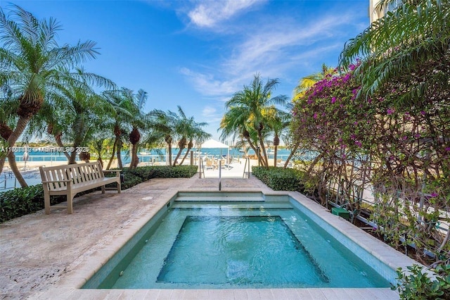 view of pool featuring fence