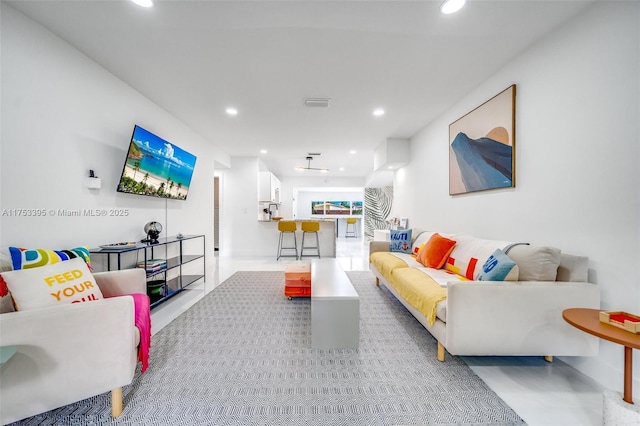 living room with visible vents and recessed lighting