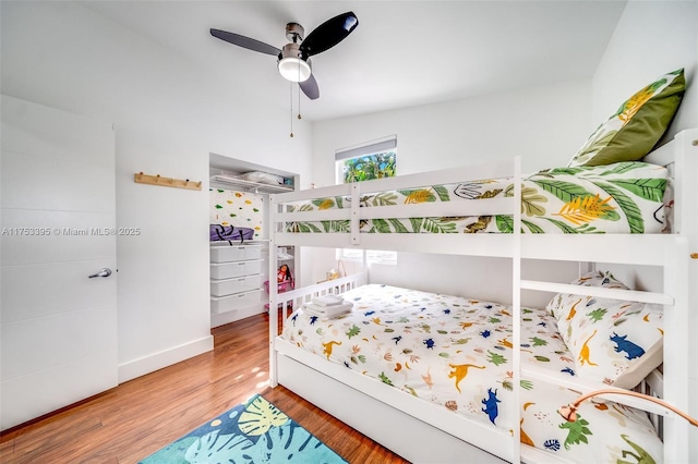 bedroom featuring ceiling fan and wood finished floors