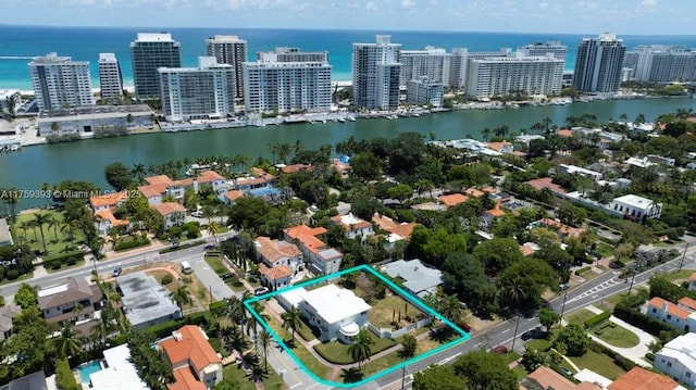 bird's eye view with a water view and a view of city