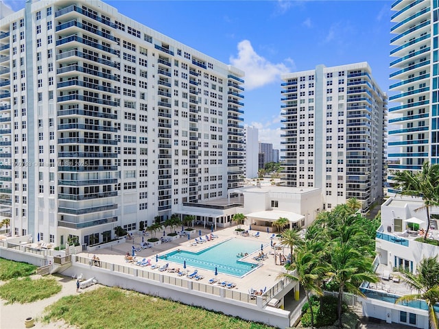 exterior space with a patio and a view of city