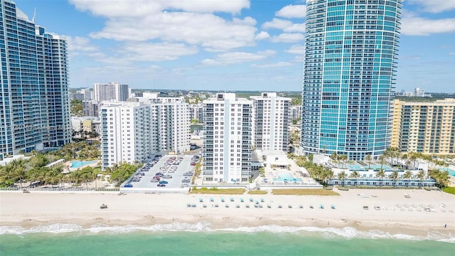 bird's eye view with a view of the beach, a view of city, and a water view