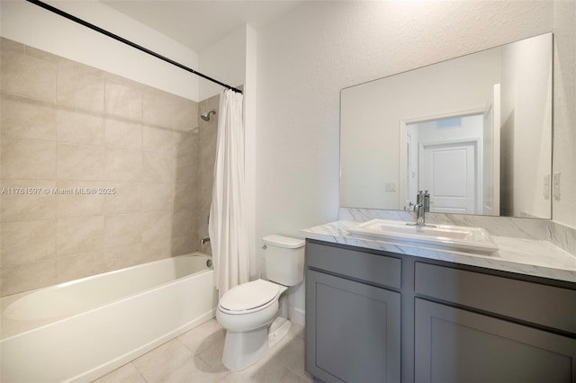 full bathroom featuring tile patterned floors, visible vents, toilet, shower / bath combo, and vanity