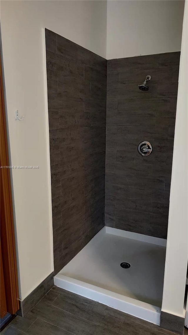 full bath featuring a stall shower