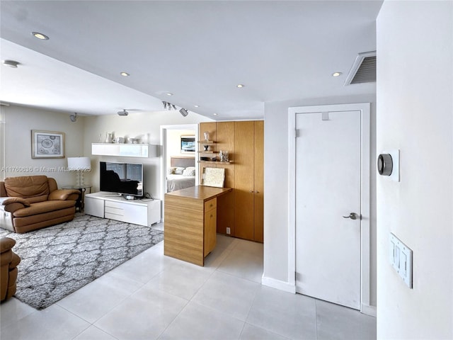 living area with light tile patterned flooring, recessed lighting, and visible vents