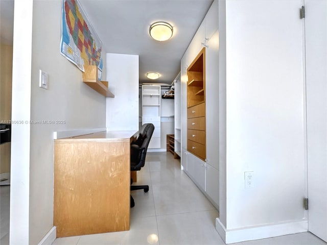 home office featuring light tile patterned floors