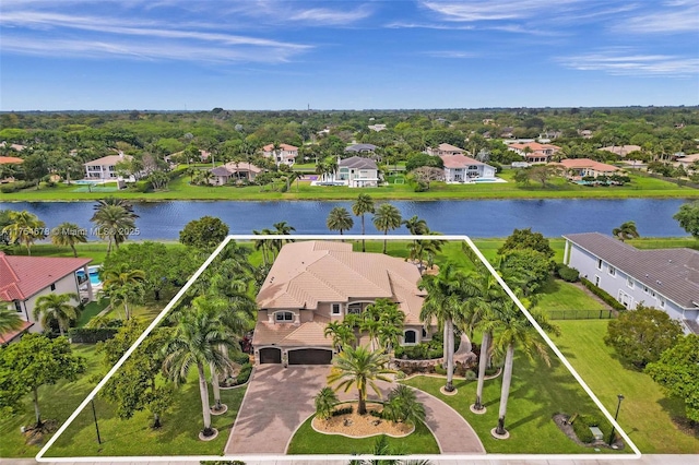 birds eye view of property featuring a residential view and a water view