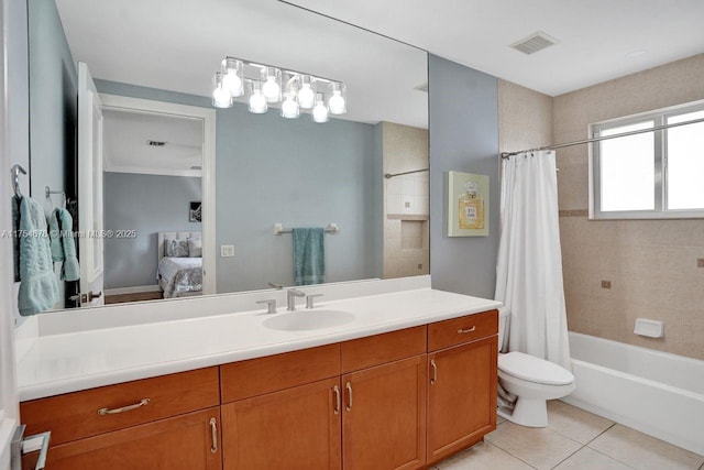 ensuite bathroom with vanity, visible vents, tile patterned flooring, ensuite bathroom, and toilet