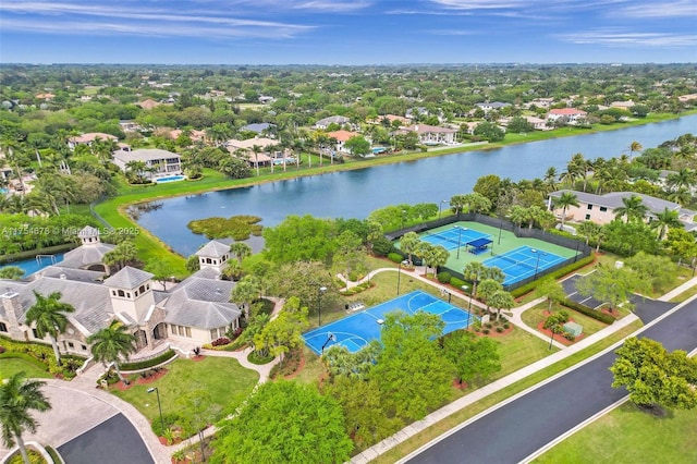 bird's eye view featuring a residential view and a water view