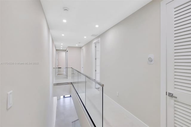 hallway featuring recessed lighting