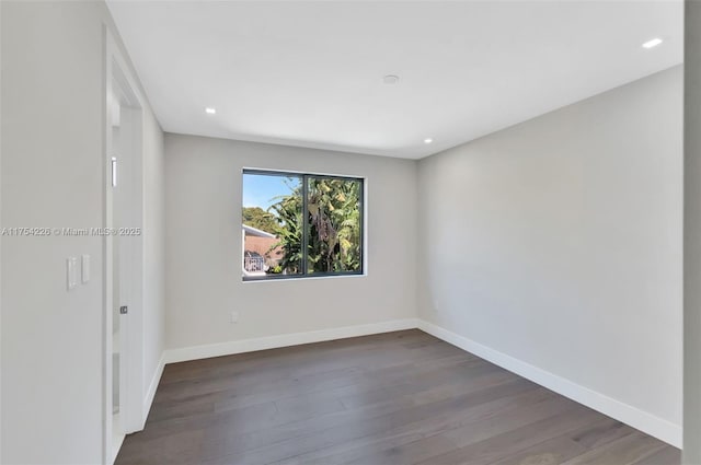 unfurnished room with recessed lighting, baseboards, and wood finished floors