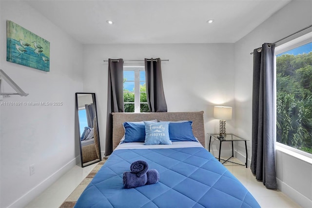 bedroom with recessed lighting and baseboards