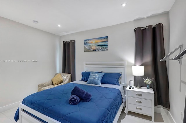 bedroom with recessed lighting and baseboards