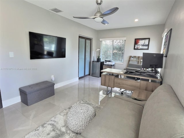 office space with recessed lighting, visible vents, baseboards, and ceiling fan