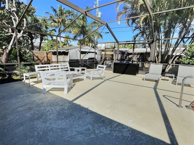 view of patio / terrace with a lanai