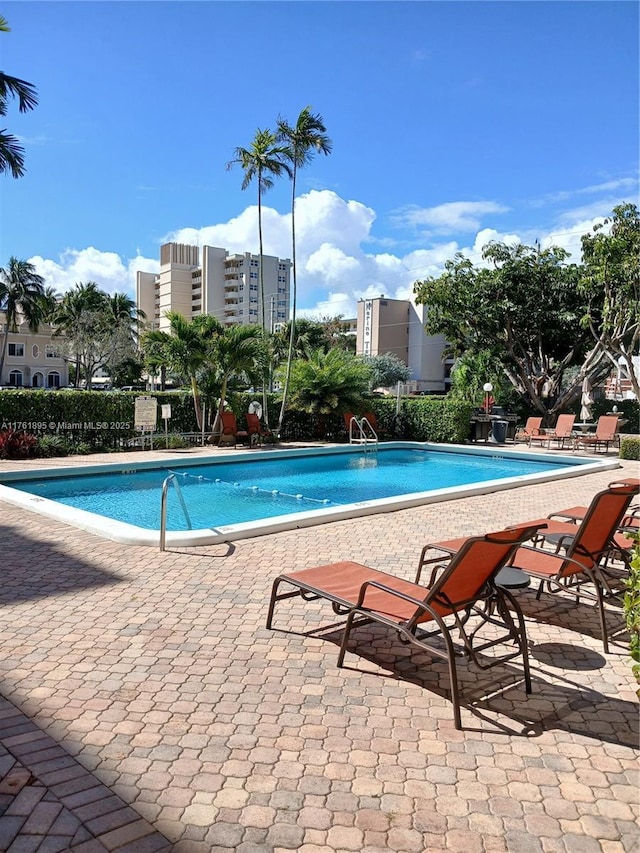 community pool featuring a patio