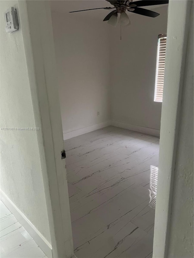 20 NE 215th St, Miami Gardens, FL 33179 - spare room with baseboards and a ceiling fan