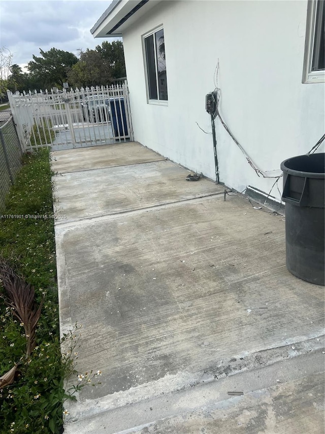 20 NE 215th St, Miami Gardens, FL 33179 - view of patio featuring fence