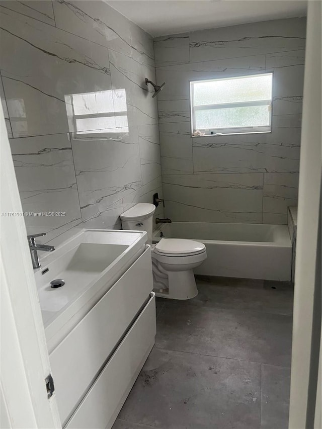 20 NE 215th St, Miami Gardens, FL 33179 - bathroom featuring vanity, bathtub / shower combination, tile walls, and toilet