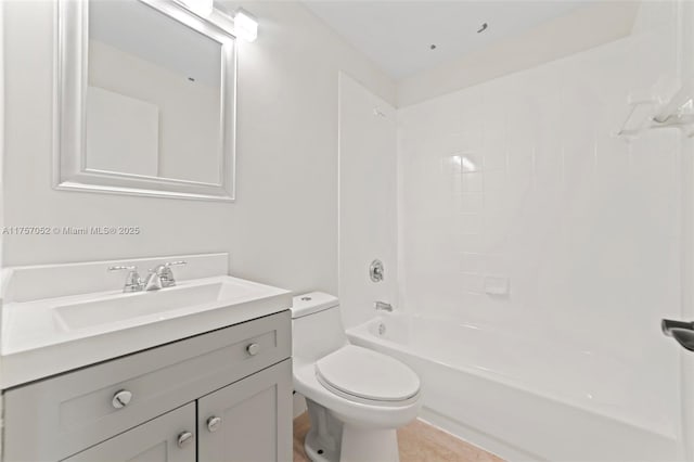 full bath with toilet, vanity, and bathtub / shower combination