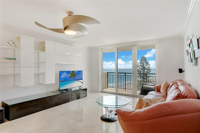 living area with ornamental molding and floor to ceiling windows