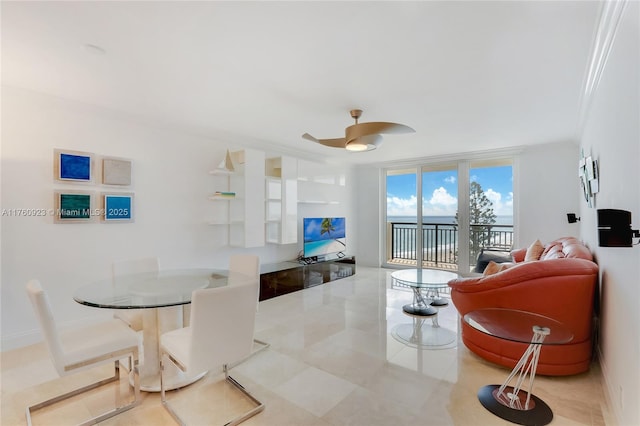 living area featuring ceiling fan