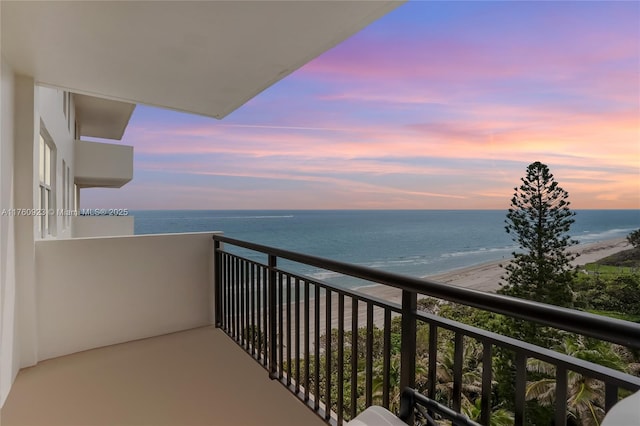 balcony at dusk with a water view