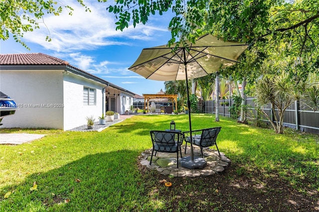 view of yard with a fenced backyard and a patio area