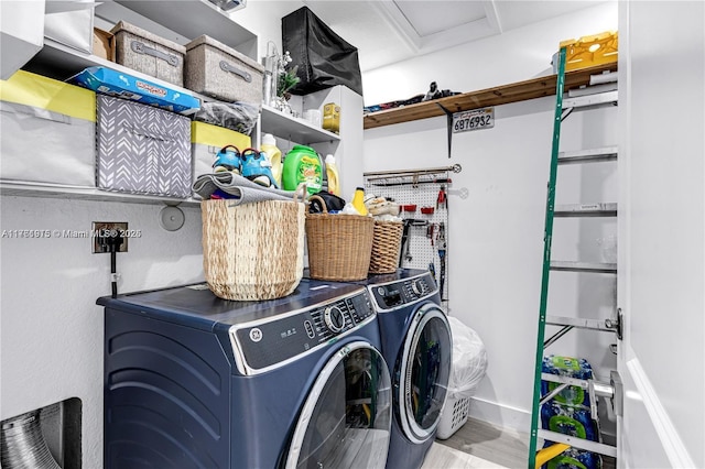 laundry area featuring laundry area and separate washer and dryer