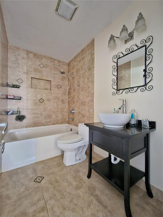 bathroom featuring tile patterned flooring, visible vents, toilet, shower / bath combination, and vanity