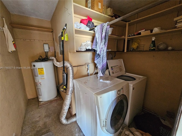 laundry area with water heater, laundry area, and washer and clothes dryer