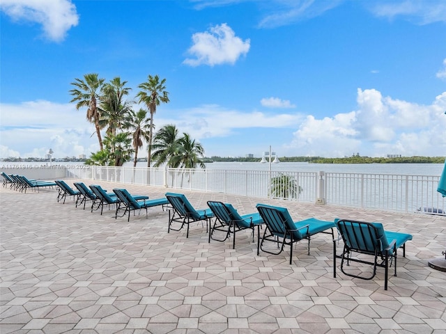 10350 W Bay Harbor Dr Unit 4H, Bay Harbor Islands, FL 33154 - view of patio / terrace featuring a water view and fence