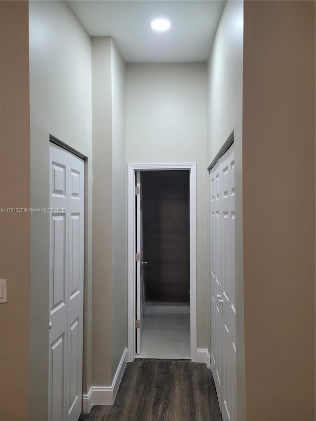 7655 SW 153rd Ct Unit 102, Miami, FL 33193 - hallway with dark wood-style flooring and baseboards