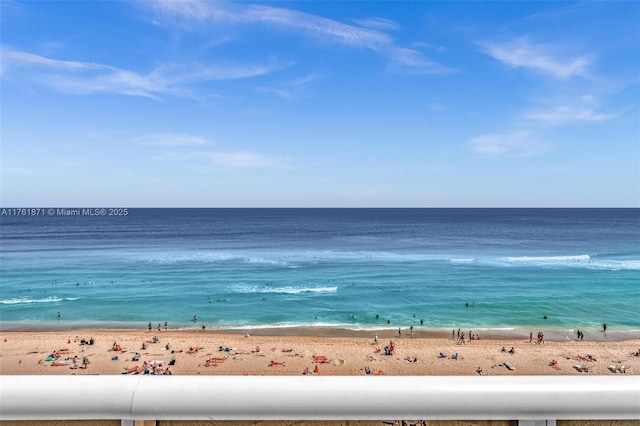 view of water feature with a beach view