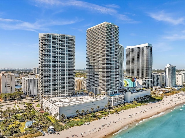 city view featuring a beach view and a water view