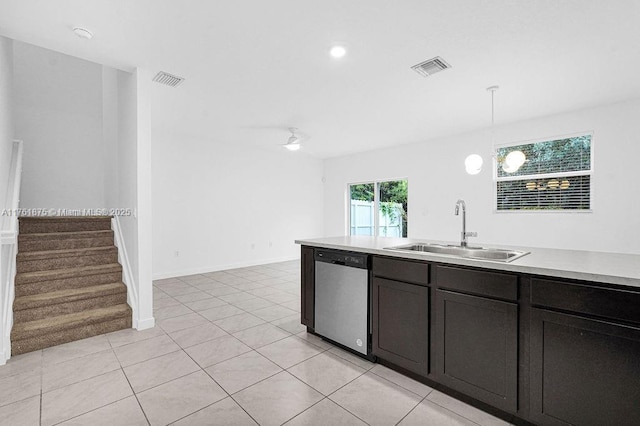 kitchen featuring a sink, light countertops, visible vents, and stainless steel dishwasher