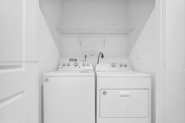 laundry room featuring laundry area and separate washer and dryer