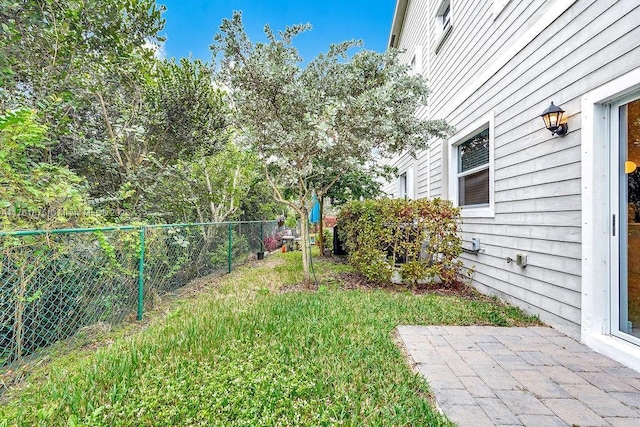 view of yard with a patio area and fence