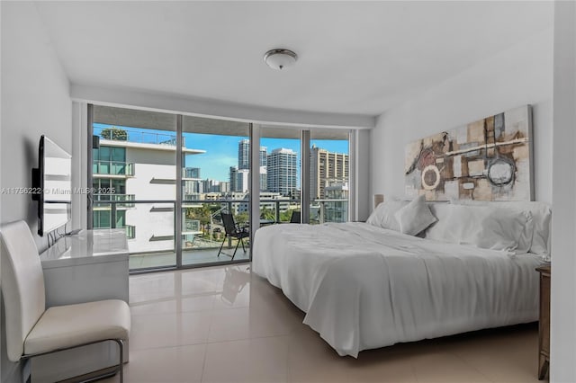 tiled bedroom with access to exterior and floor to ceiling windows