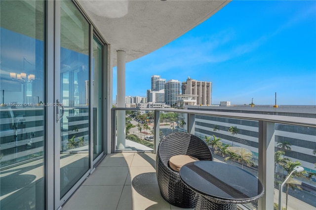 balcony featuring a city view