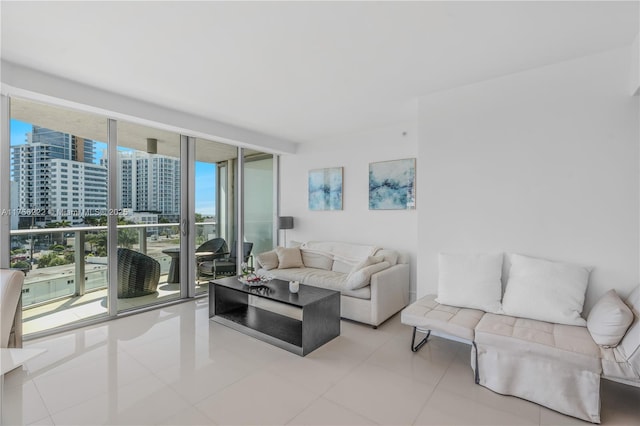 living area with a view of city and floor to ceiling windows