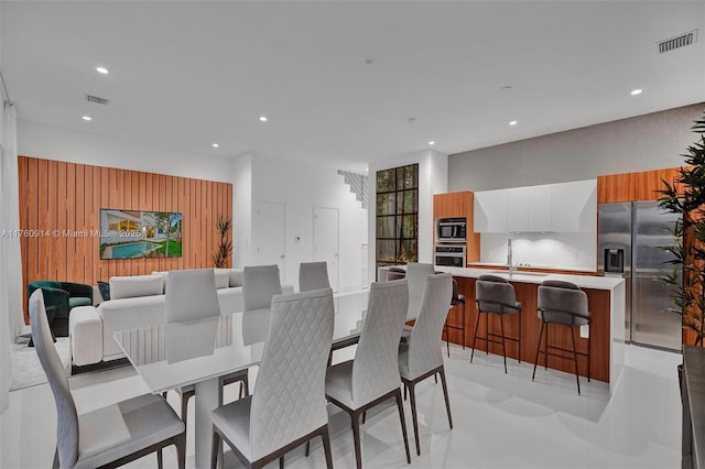 dining area featuring visible vents and recessed lighting