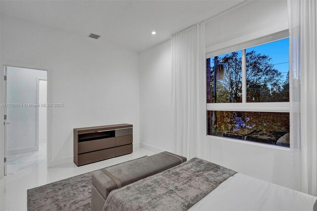 bedroom with visible vents and recessed lighting