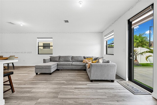 3489 W 110th Ter, Hialeah, FL 33018 - dining space featuring recessed lighting, visible vents, and light wood finished floors