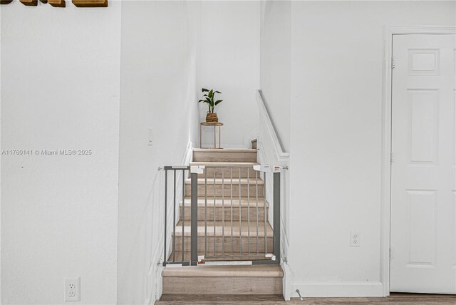 3489 W 110th Ter, Hialeah, FL 33018 - living room featuring visible vents, light wood finished floors, and baseboards