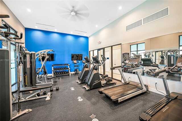 3489 W 110th Ter, Hialeah, FL 33018 - rear view of property with a lawn, a patio, a fenced backyard, and stucco siding