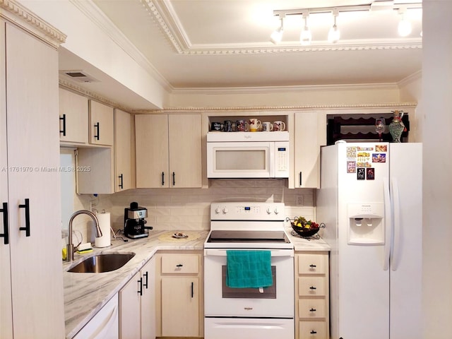 kitchen with visible vents, a sink, tasteful backsplash, white appliances, and crown molding