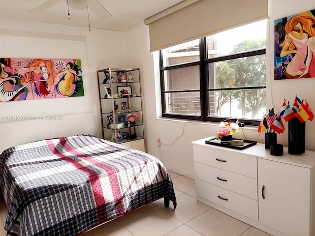 bedroom featuring light tile patterned flooring