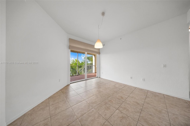 empty room with light tile patterned floors