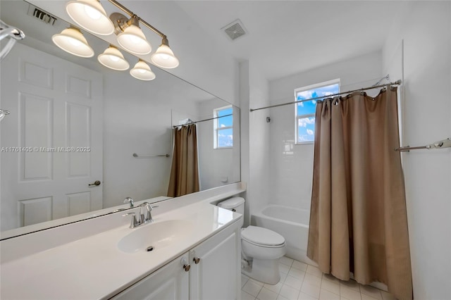 full bathroom with vanity, toilet, shower / tub combo, visible vents, and tile patterned flooring